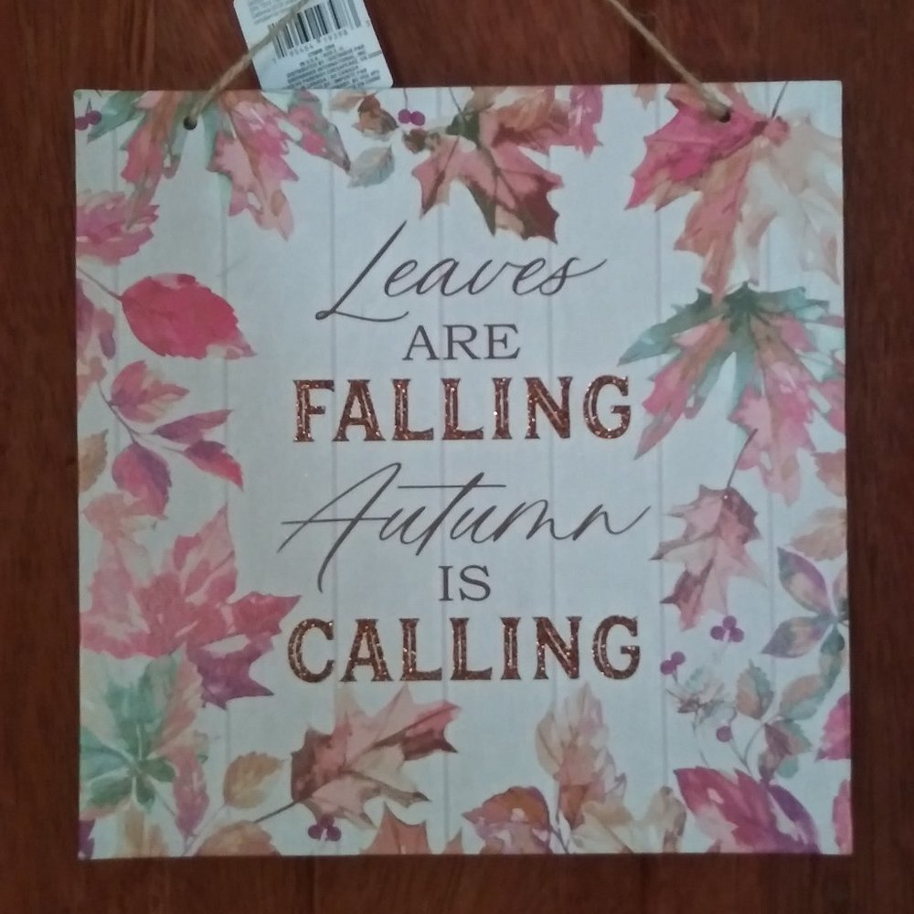 "Leaves are Falling, Autumn is Calling" sign